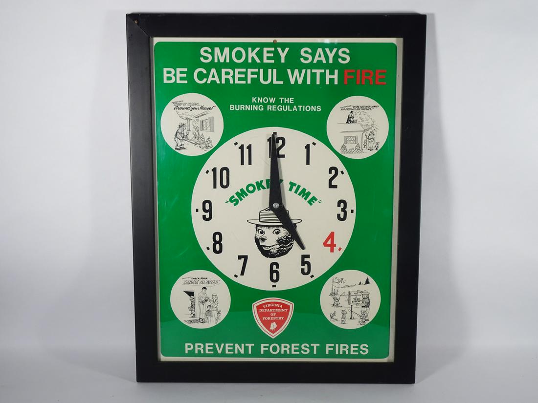 Smokey the Bear Regulations Display Sign: Framed Smokey the Bear "Know the Burning Regulations" display sign with clock face center design, put out by The Virginia Department of Forestry, circa 1960's-1970's, 23 1/2" (height) x 17 1/2" (lengt