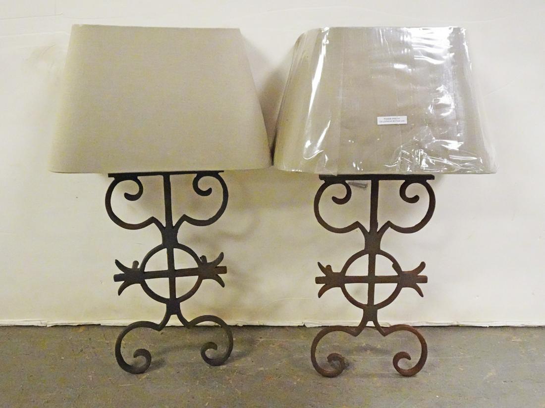 Pair of Luminaire Wall Mount Lights: Pair of Luminaire wall mount lights , cast iron with shades, contemporary 20th c., both have Luminaire labels on verso, 22" (height) x 13" (length)