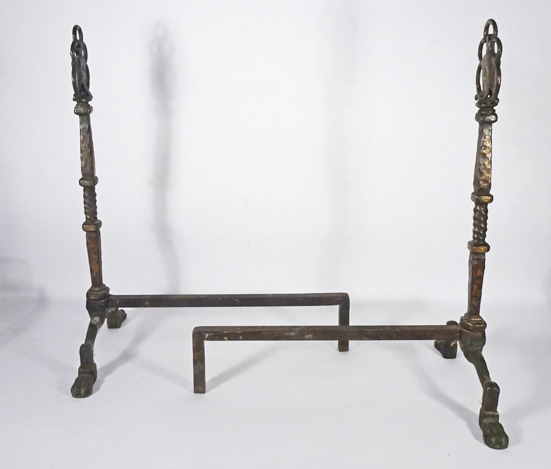 Arts and Crafts Wrought Iron Andirons: Pair of Arts and Crafts patinated wrought iron andirons, bird form on top portion, paw feet, manufacturer unknown, early 20th c., 24 1/2" (height) x 12 1/2" (length) x 19 1/2" (width)