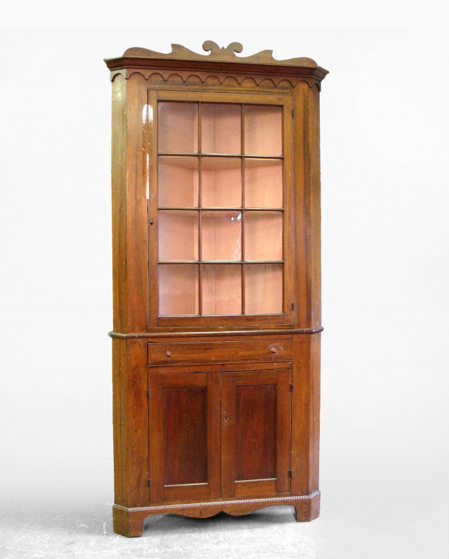 Poplar corner cupboard, two piece, scalloped corni: Poplar corner cupboard, two piece, scalloped cornice, twelve glazed panels in single door, over one long drawer, above a pair of recessed paneled doors, bracket feet, mid 19th C., measures 92" high x 