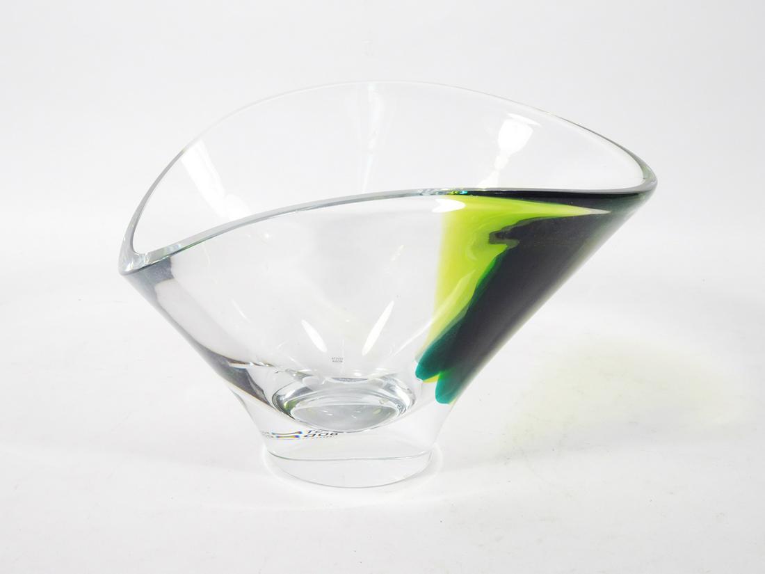Kosta Boda Decorative Glass Aria Bowl: Kosta Boda decorative glass Aria bowl, designed by Goran Warff, clear with green and chartreuse accent, contemporary 20th c., signed on underside of base "Kosta Boda G. Warff 7050719" and with paper l