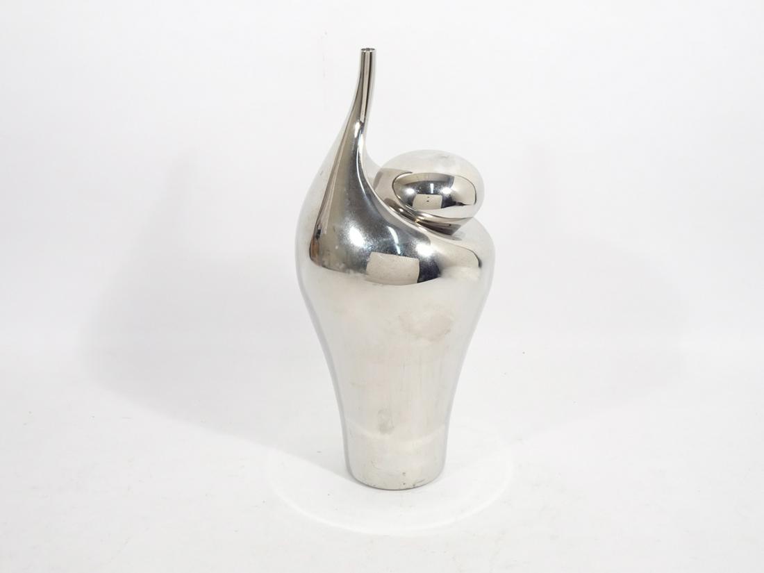 Georg Jensen Stainless Steel Sculptural Pitcher: Georg Jensen stainless steel sculptural pitcher, reminiscent of an Ancient Egyptian headdress, pebble shaped stopper that sits within a depression in the pitcher as if its weight has distorted the for
