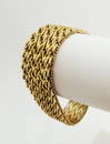 Ladies woven 18 karat yellow gold bracelet