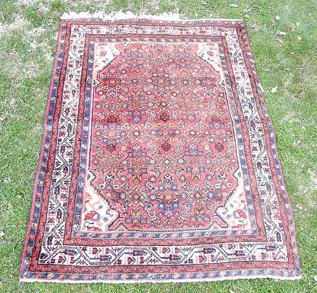 Hand tied Persian rug, cloth label on bottom "Made: Hand tied Persian rug, cloth label on bottom "Made in Iran", 4'10" x 6'8