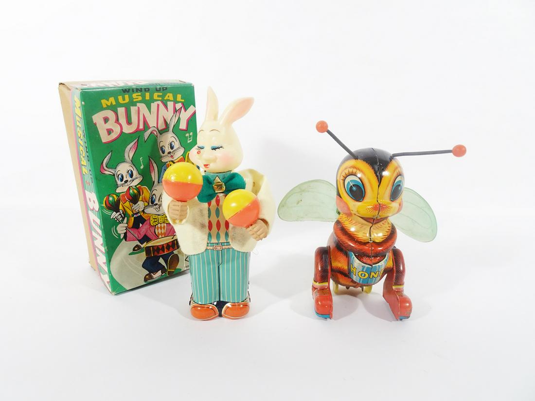 1950's-60's Japanese wind ups: 1950's-60's Japanese wind-ups, one in original box. Includes a wind-up musical bunny in original box. Bunny plays maracas. Second is a wind up bee with flexible plastic wings. Both with keys and in wo