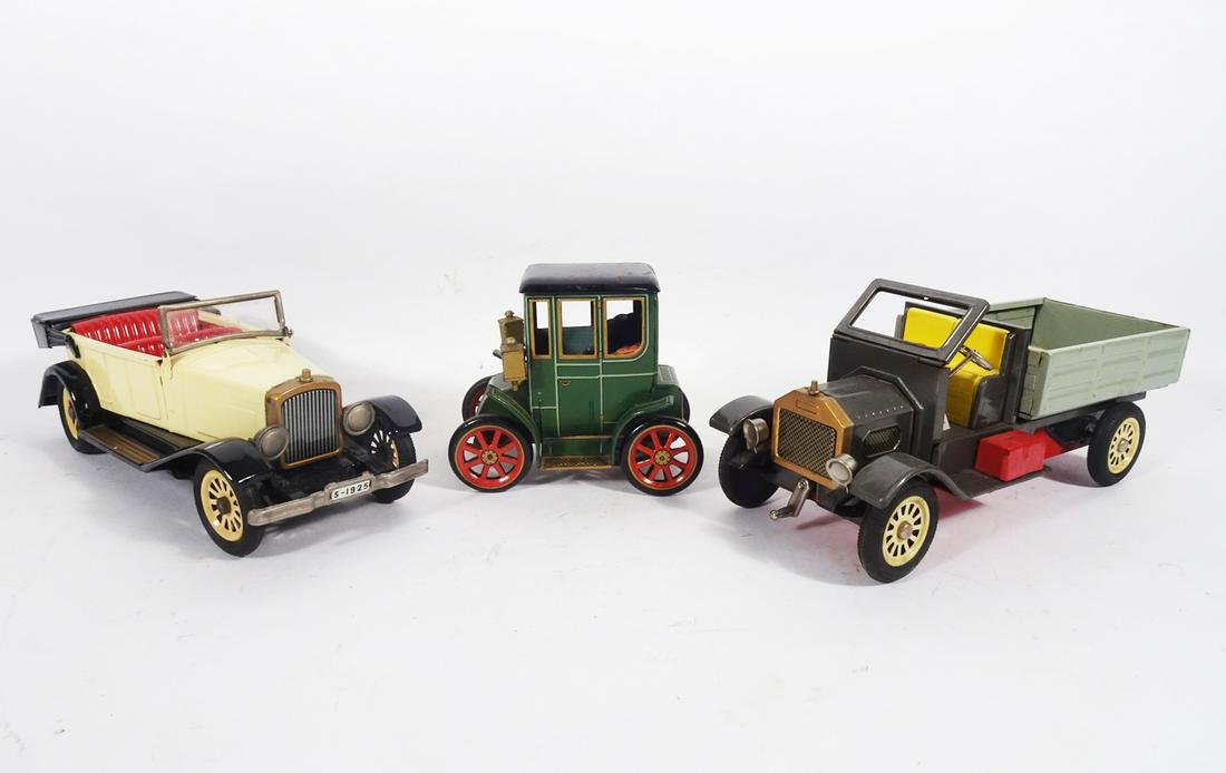 Three 1960's-70's Japanese friction old time cars and a truck. (1 of 4)