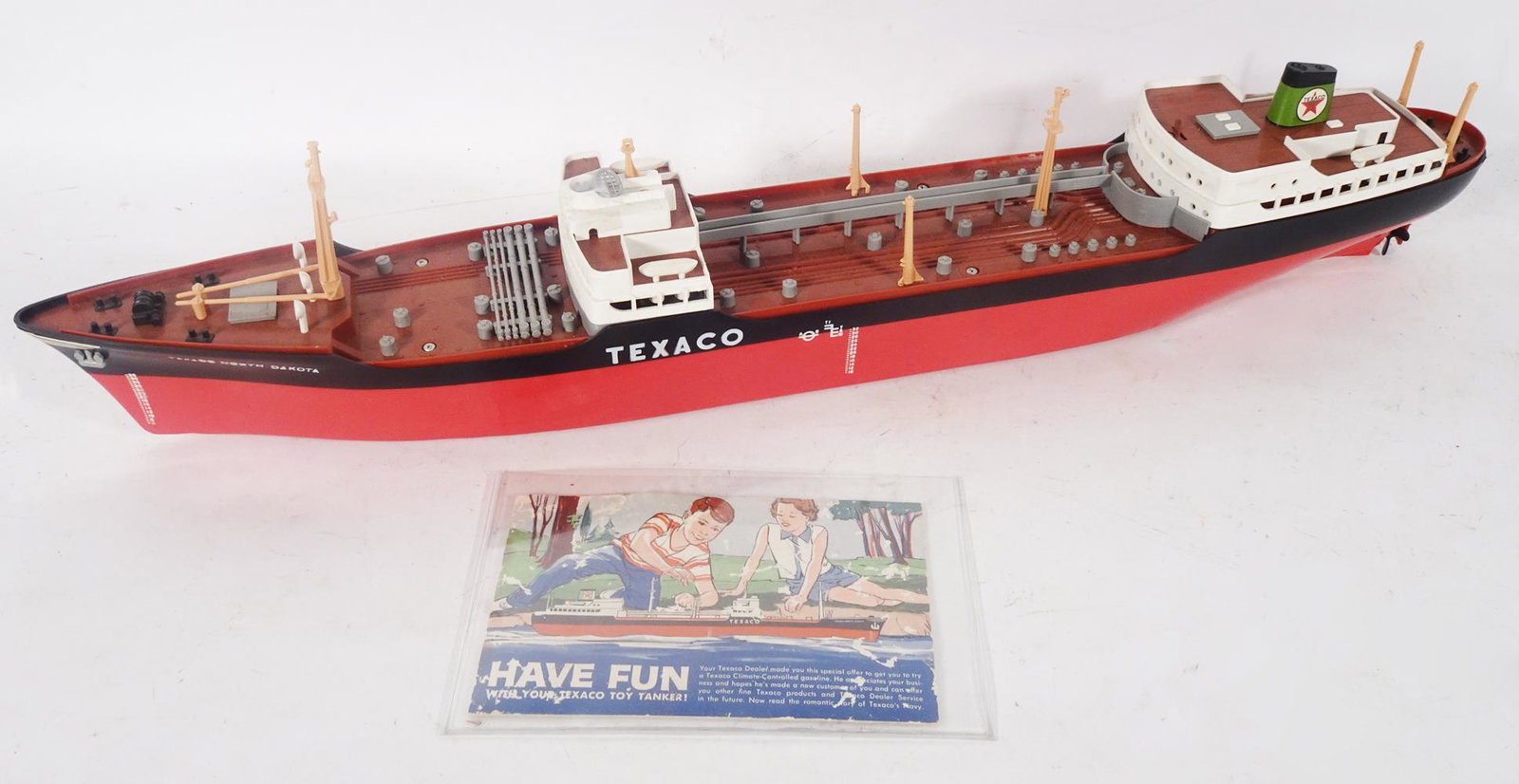 1960's Texaco tanker in original box.: 1960's Texaco tanker in original box. Tanker ship is complete and looks unbroken. Original box has the two inserts. Comes with the original pamphlet. Does not have the send away stand. Box measures 28