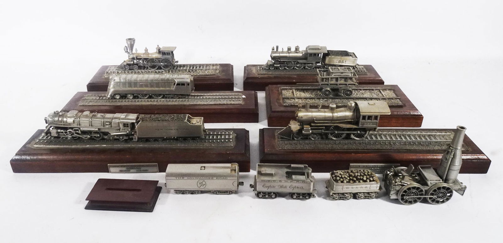 Six (of twelve) 1980's Franklin Mint Steam Engines of History series on display bases. (1 of 5)