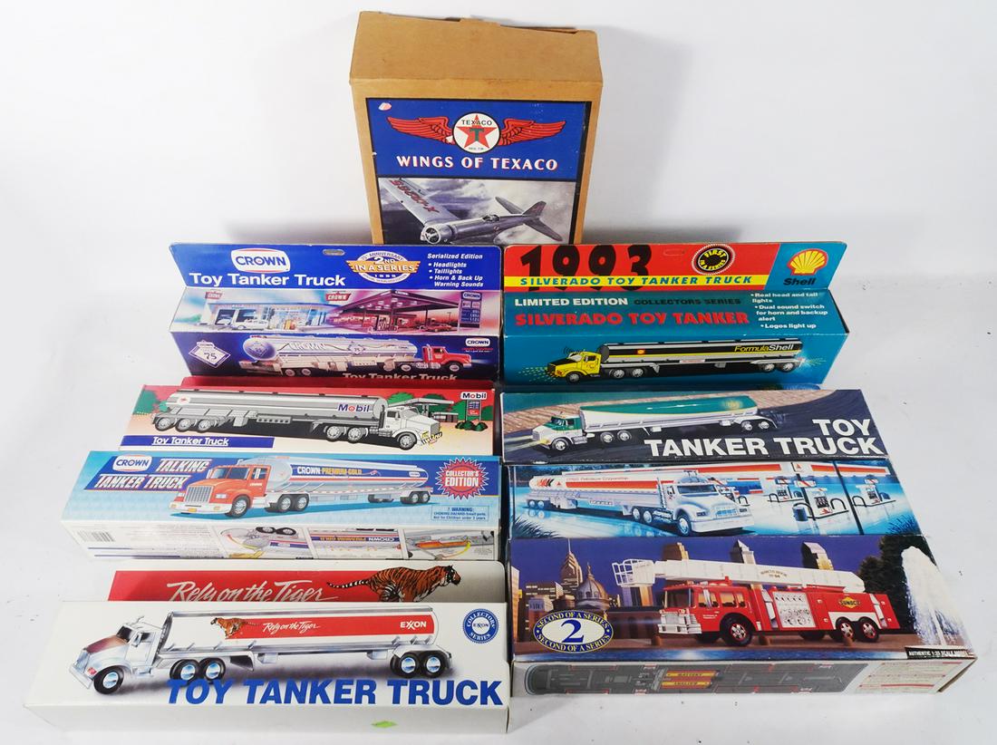 Eight 1980's-1990's assorted gas station tanker trucks and one Texaco airplane. (1 of 4)