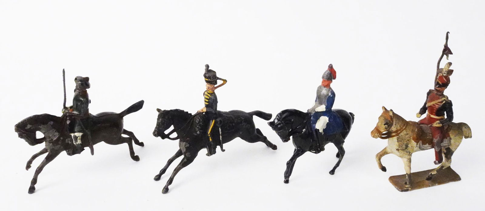 Seven 1960's French made Napoleonic Wars mounted soldiers.: Seven 1960's French made Napoleonic Wars mounted soldiers. See pictures for units. There is also a short staffed loose flag. No boxes.