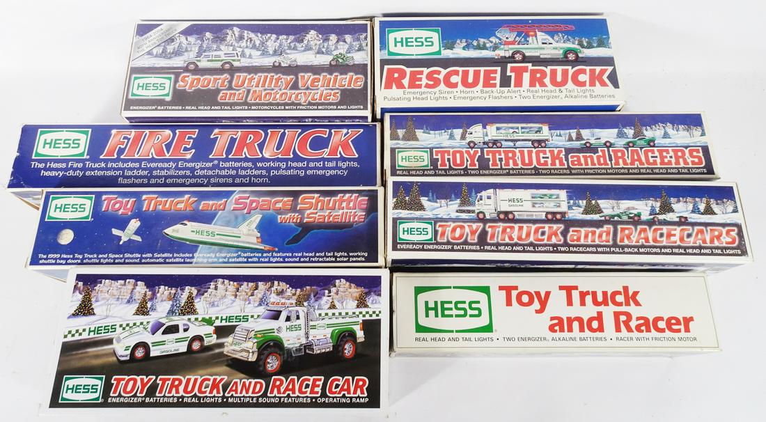 Eight 1990's-2000's Hess gas station trucks in original boxes. (1 of 3)