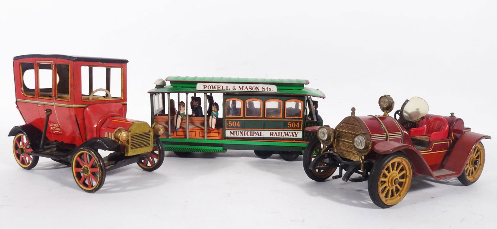 Three tin vehicles, one is a Schucco. (1 of 4)