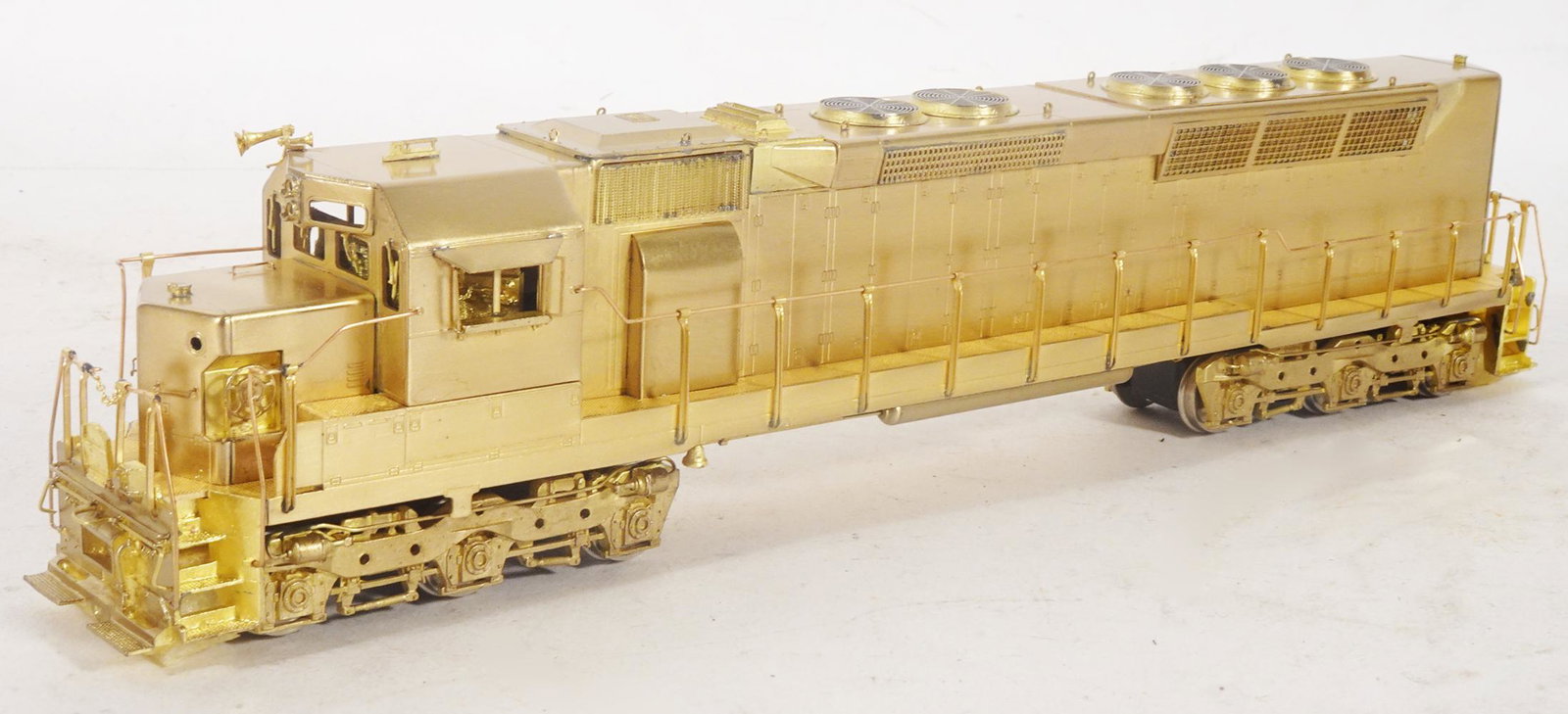 1980's brass HO gauge diesel locomotive in original box.: 1980's brass HO gauge diesel locomotive in original box. This is an EMD 3600 horsepower SDP45 (Erie version) diesel by Oriental Limited (Korea). This is still wrapped in factory paper unused. Engine i