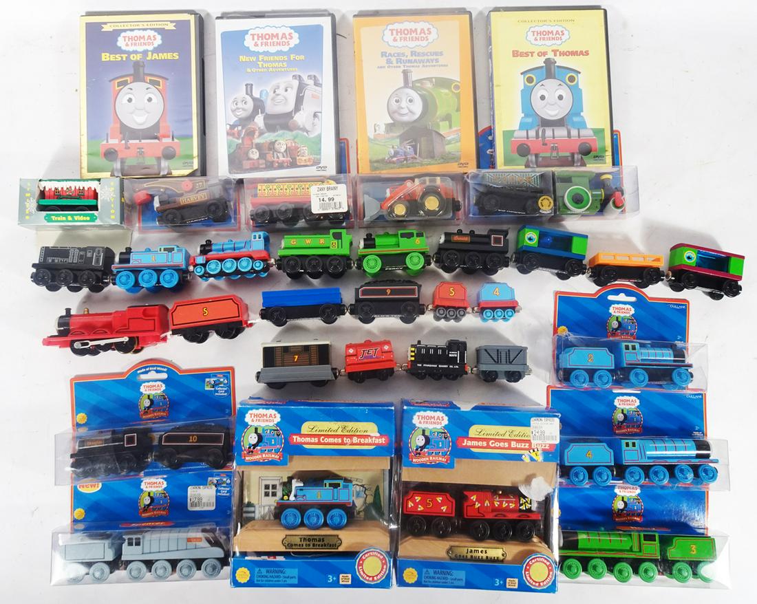 Large lot of loose and packaged Thomas the Tank Engine and Friends trains and four DVD's. (1 of 3)