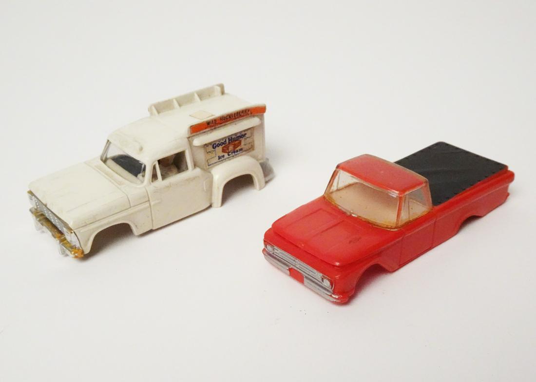 Two 1960's Aurora T-Jet truck bodies, Good Humor truck and red pick-up.: Two 1960's Aurora T-Jet truck bodies, Good Humor truck and red pick-up. These are just bodies, no chassis. The pick-up is the red body with black bed, tan interior. The Good Humor truck body has orang