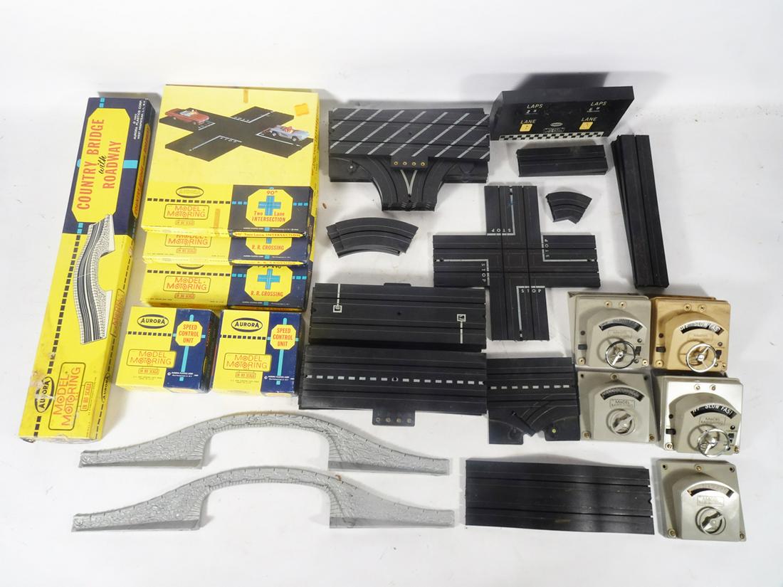 One large lot of Aurora HO scale special section slot car track and accessories, some in original (1 of 3)