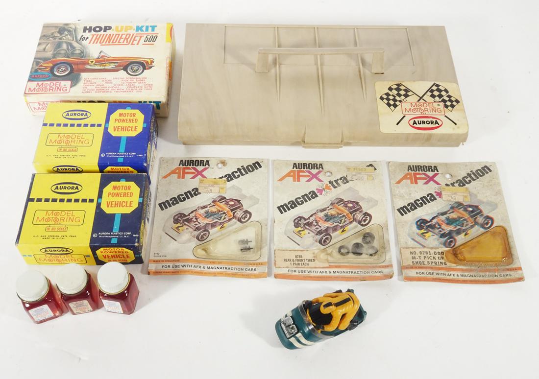 One lot of assorted Aurora slot car parts and pit kit.  Lot consist of 2 original boxes for slot car (1 of 5)