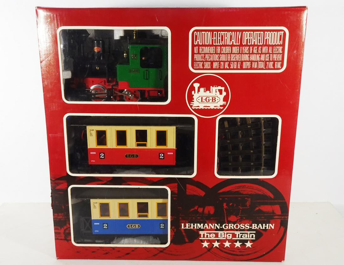 1990's LGB The Big Train G scale passenger set in original box.: 1990's LGB The Big Train G scale passenger set in original box. Set consists of a 0-4-0 green steam engine and two short passenger cars. Also comes with track, power pack and 4 plastic people in the o