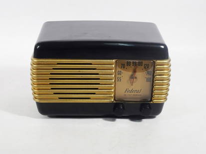 Federal Model 1040TB Tabletop Radio: Federal Radio Corp./Federal Telephone and Telegraph Co. model 1040tb tabletop radio, circa 1947, black and gold plastic case, 5 tubes, 6 AM tuned circuits, broadcast only wave band, 6 1/4" high x 10