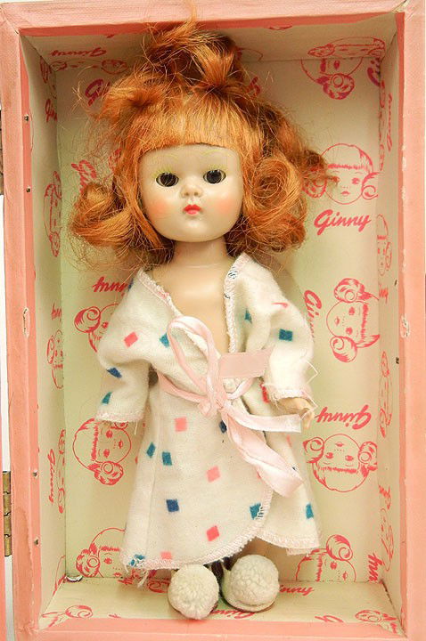 Ginny Vogue doll, 7 1/2", with Ginny case and clot: Ginny Vogue doll, 7 1/2", with Ginny case and clothing (some tagged), sleep eyes, painted lashes, auburn hair, hard plastic strung body, C.1950's