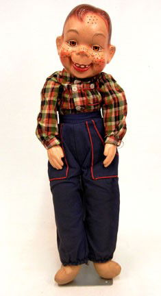 Effanbee Howdy Doody with composition head and arm: Effanbee Howdy Doody with composition head and arms, 22", brown sleep eyes, and a cloth body, in original clothing