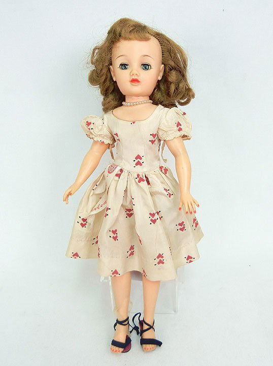 "Miss Revlon" by Ideal, 18", vinyl socket head, jo: "Miss Revlon" by Ideal, 18", vinyl socket head, jointed adult-shaped hard plastic body, vinyl arms, rooted blonde hair, blue sleep eyes, painted and applied lashes, red lips, wears tagged white nylon