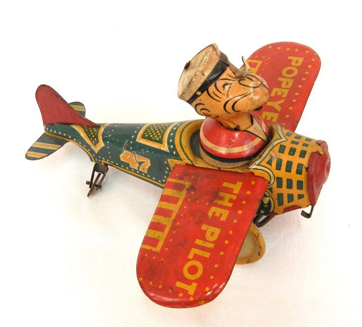 Popeye the Pilot, Louis Marx, lithographed tin, wi: Popeye the Pilot, Louis Marx, lithographed tin, wind-up, marked under wing