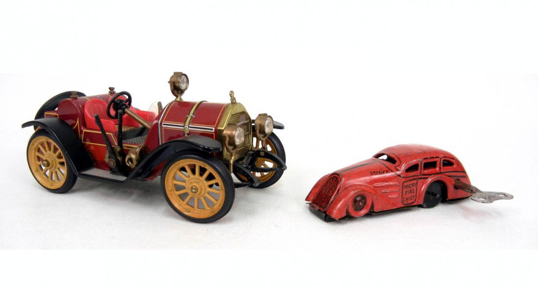 Two tin wind-ups, Schuco Mercer #1225 Old Timer ca: Two tin wind-ups, Schuco Mercer #1225 Old Timer car 7 1/2" long, & Marx Tricky Fire Chief 4 1/2" long
