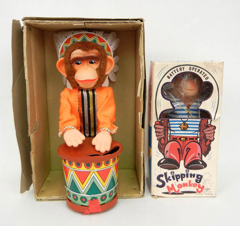 Two battery operated toys including 1). Skipping M: Two battery operated toys including 1). Skipping Monkey T.N. Japan with original box, box measures 10" x 5"; and 2). Big John The Chimpee Chief Alps Japan with original box 13" x 8