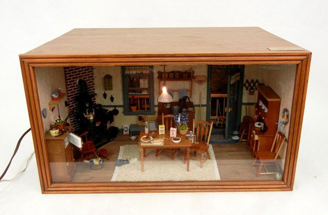 Hand crafted lighted roombox, well appointed kitch: Hand crafted lighted roombox, well appointed kitchen with oak icebox, cast iron stove in corner, table and chairs, china cabinet, etc, 10 1/4" high x 19" x 14", mid to late 20th C.