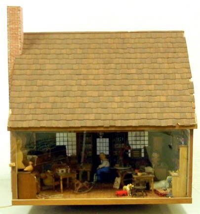 Hand crafted lighted roombox,Country Store with tw: Hand crafted lighted roombox,Country Store with two seated men, well stocked shelves, spool cabinet, roll top desk, butcher block, cash register, dog and cat, etc, 26" high x 26" x 29", exterior of st