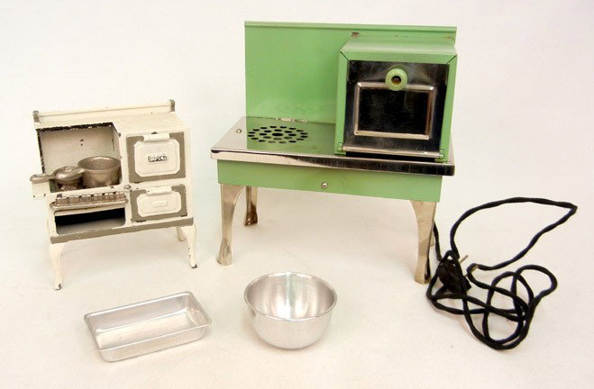 Two toy stoves, including Roper stove with two pa: and an electric toy stove 8 3/4"