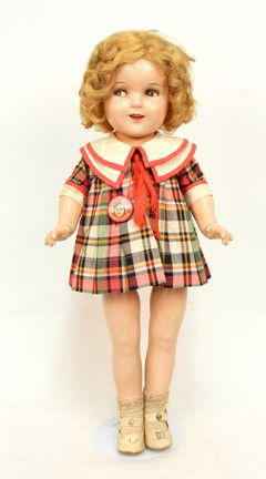 Ideal Shirley Temple composition doll, 20": All composition doll with sleep eyes, wearing original plaid dress, also has original wig, shoes and socks, and a metal pin back button "My Friend Shirley Temple", head marked Shirley Temple Ideal 20,
