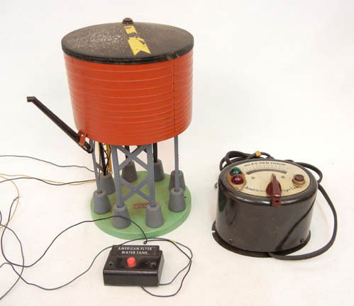 American Flyer Lines transformer and American Flye: Water Tank. Model 8B 100 watts transformer by The A.C. Gilbert Co. Metal Water Tank by the A.C. Gilbert Co. measures 10", dated April '50.