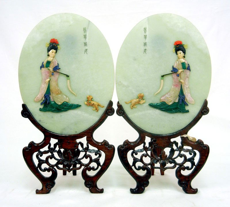 Pair of jade oval plaques, semi-precious stone figu: Pair of jade oval plaques, semi-precious stone figural inlay, incised Chinese character marks on top left, with wooden stands, plaques measure 10 3/4" high x 8 1/4" across