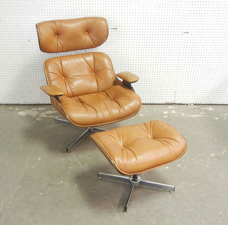 Charles Eames style leather lounge chair with otto: Charles Eames style leather lounge chair with ottoman, mid 20th C., chair measures 37" x 33" x 30", ottoman 16" x 21" x 18"