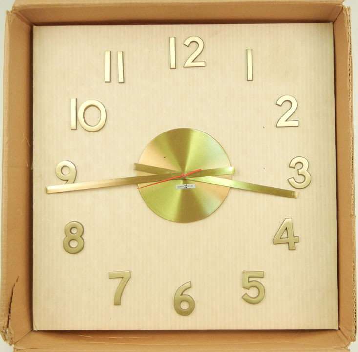 Howard Miller wall clock, in original box (for mou: Howard Miller wall clock, in original box (for mounting in wall), 19" square in packaging, mid 20th C.