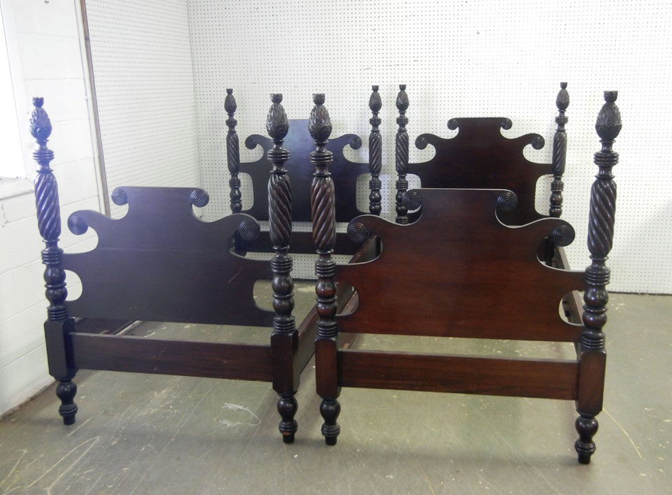 Pair of mahogany twin pineapple poster beds, rope : Pair of mahogany twin pineapple poster beds, rope turned posts, turned ball and peg feet, early 20th C., 54 1/2" x 42" x 82