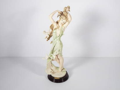 Giuseppe Armani Capo di Monte Sculpture: Giuseppe Armani Capo di Monte sculpture, titled "Aurora-Girl with Doves", item #0884C, signed on front right side of base "Giuseppe Armani", signed on verso "1992 Florence" with Capo di Monte mark and