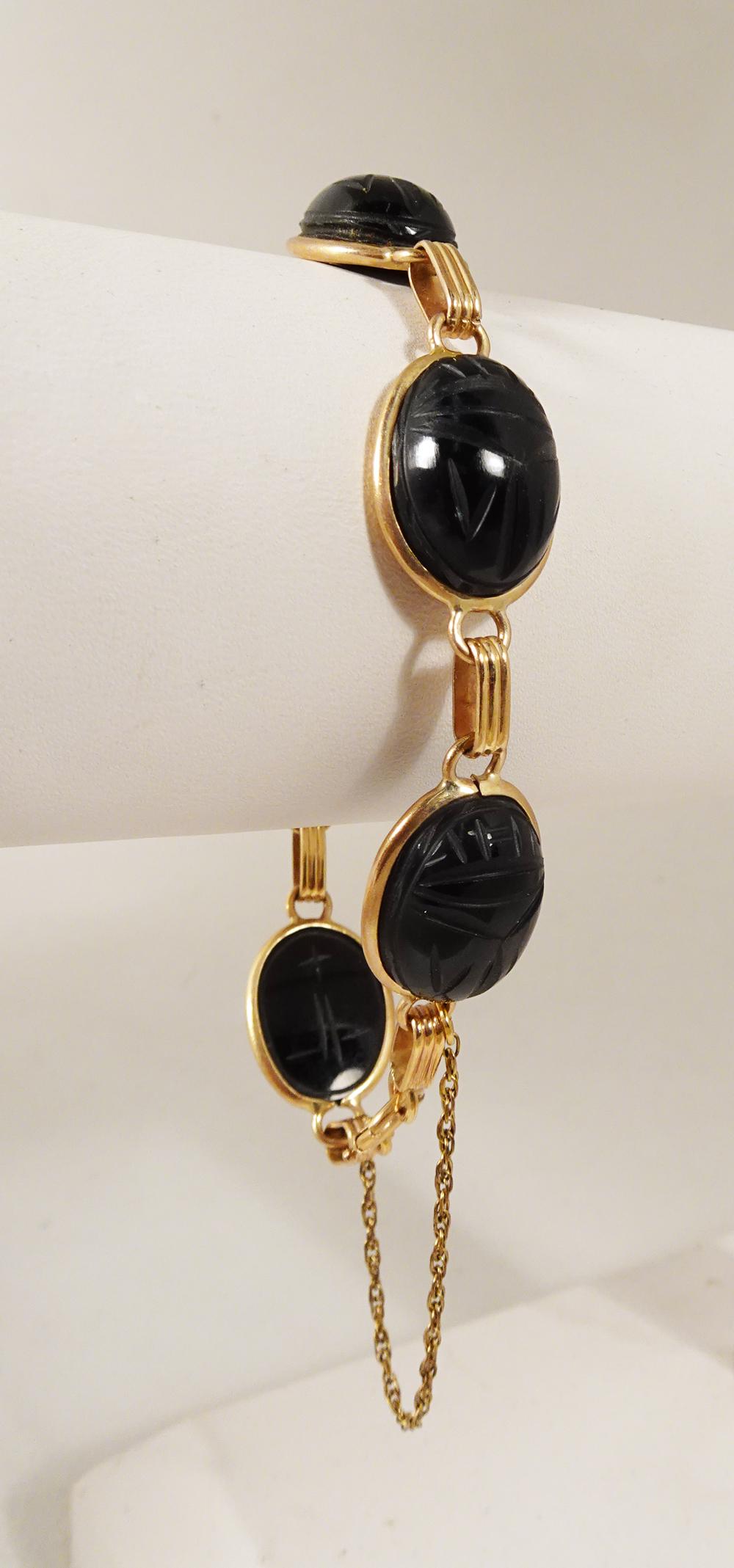 Black Scarab Bracelet 14k Yellow Gold: Black scarab bracelet 14k yellow gold: stamped: FAB, Test: 14k, 7" with spring ring and safety chain, 17x15mm scarabs, 10.2 dwt