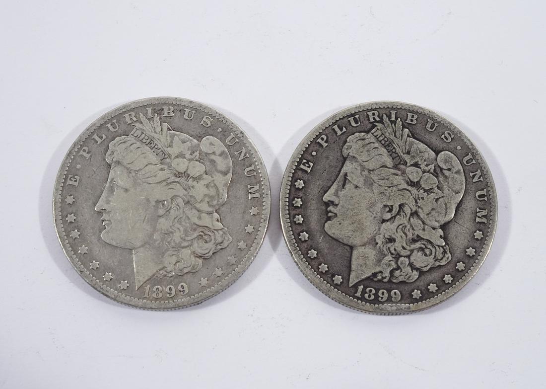 Morgan Silver Dollars: Two 1899-O Morgan silver dollars