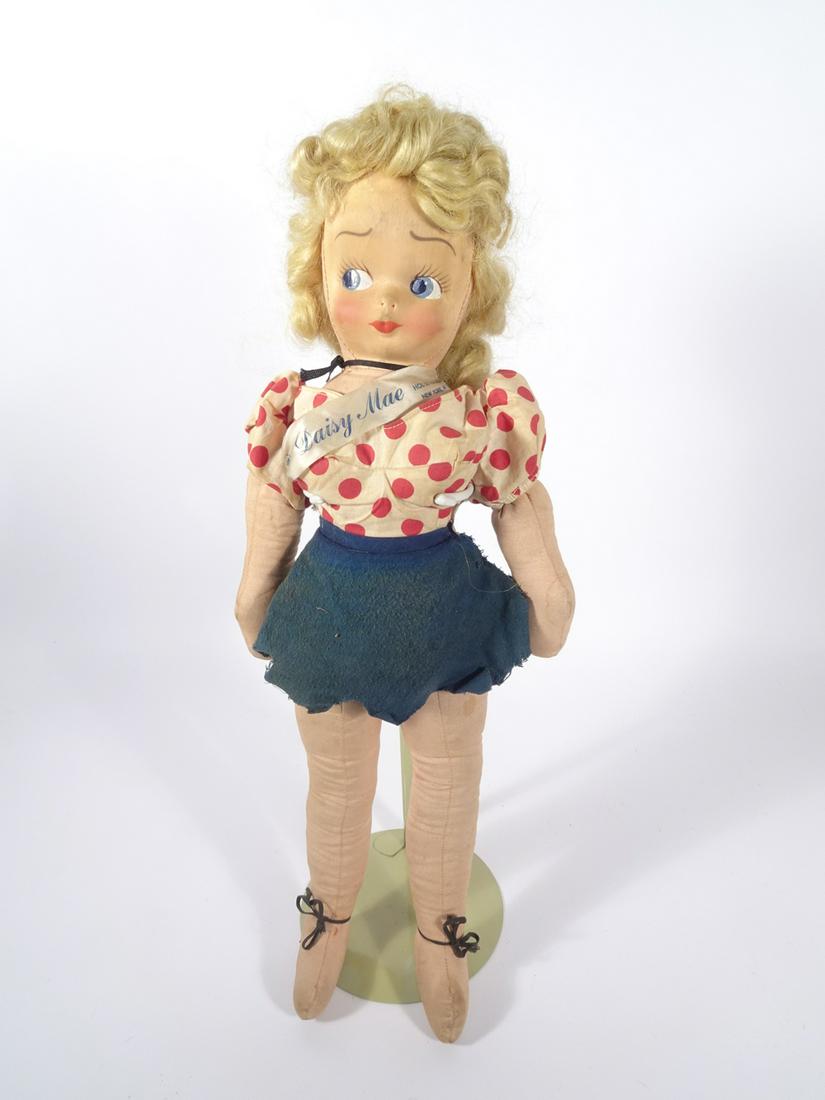 Li'l Abner Daisy Mae doll: Li'l Abner Daisy Mae doll, 21", 1950's. Satin sash reads "Al Capp's/Daisy Mae/Copyright UFS/Hol-le Toy Co. New York, N.Y." Attached to snap on flannel skirt is tag reading "Daisy Mae/By Al Capp Copyri