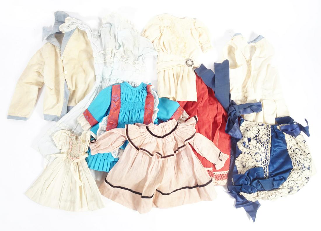 Antique and vintage doll dresses: Antique and vintage doll dresses, many factory untagged, various sizes and materials