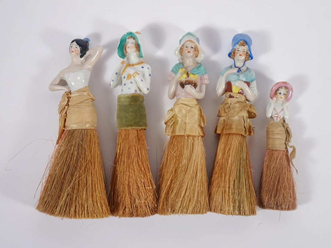 Half-doll clothes brushes (1 of 2)