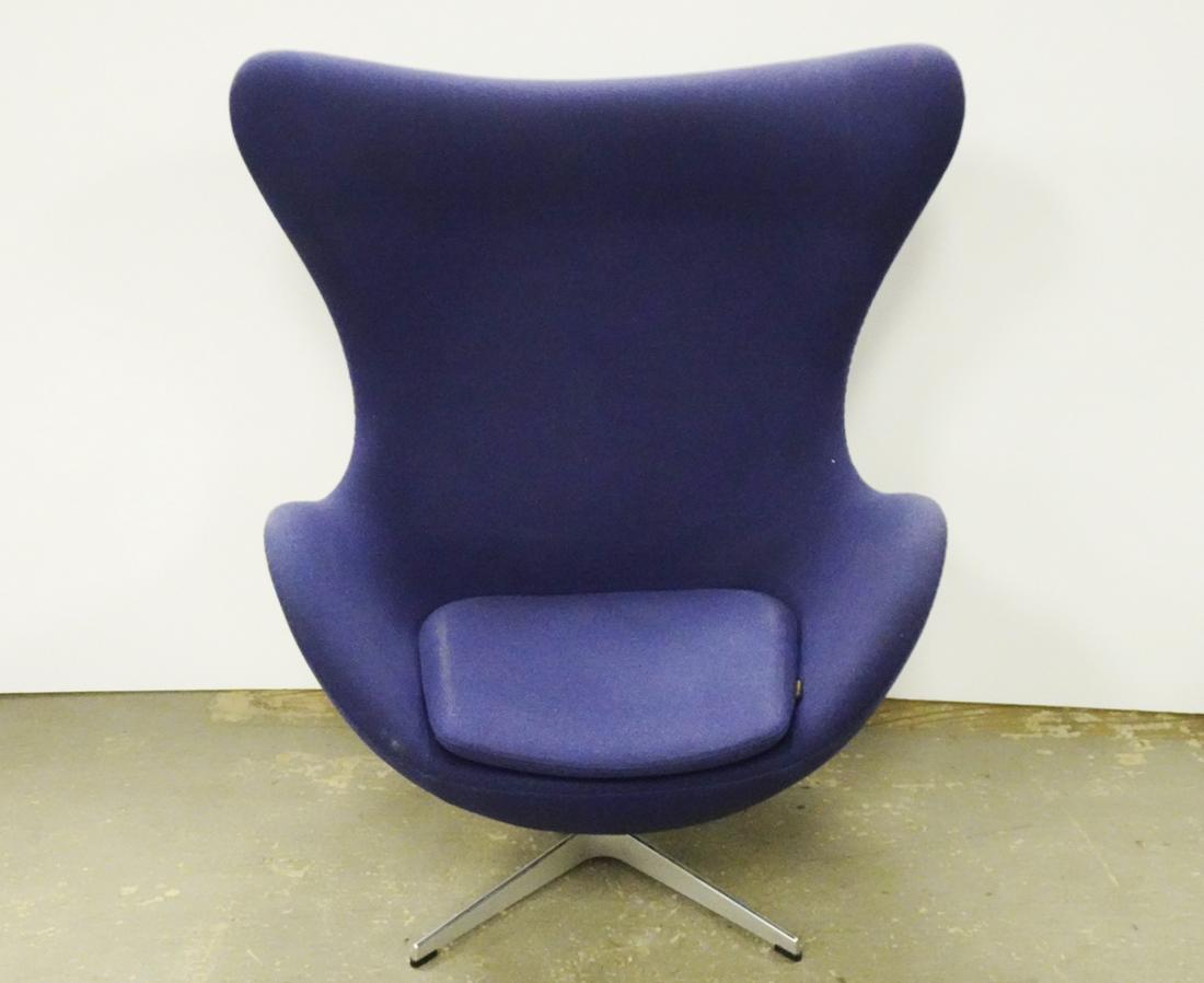 Fritz Hansen Inc. Egg Chair: Republic of Fritz Hansen Inc. egg chair, designed by Arne Jacobsen, blue upholstery with aluminum swivel base, chair has lever and tilts, circa 2016, underside has attached Fritz Hansen Inc. labels an