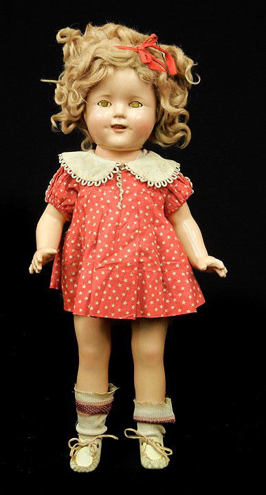 Ideal composition Shirley Temple 17" doll, sleep ey: Ideal composition Shirley Temple 17" doll, sleep eyes with applied eyelashes, open mouth with teeth, original tagged dress, slip with attached panty, socks, and leather shoes, ribbon in hair, marked o