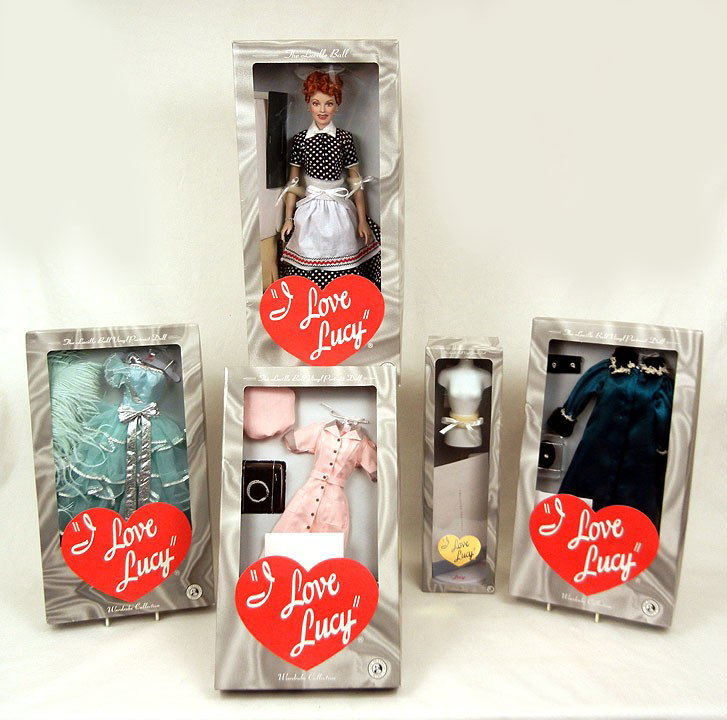 Franklin Mint "I Love Lucy" vinyl portrait doll, 15: Franklin Mint "I Love Lucy" vinyl portrait doll, 15 1/2", with dress form, and three complete outfits, all in original boxes, and trunk