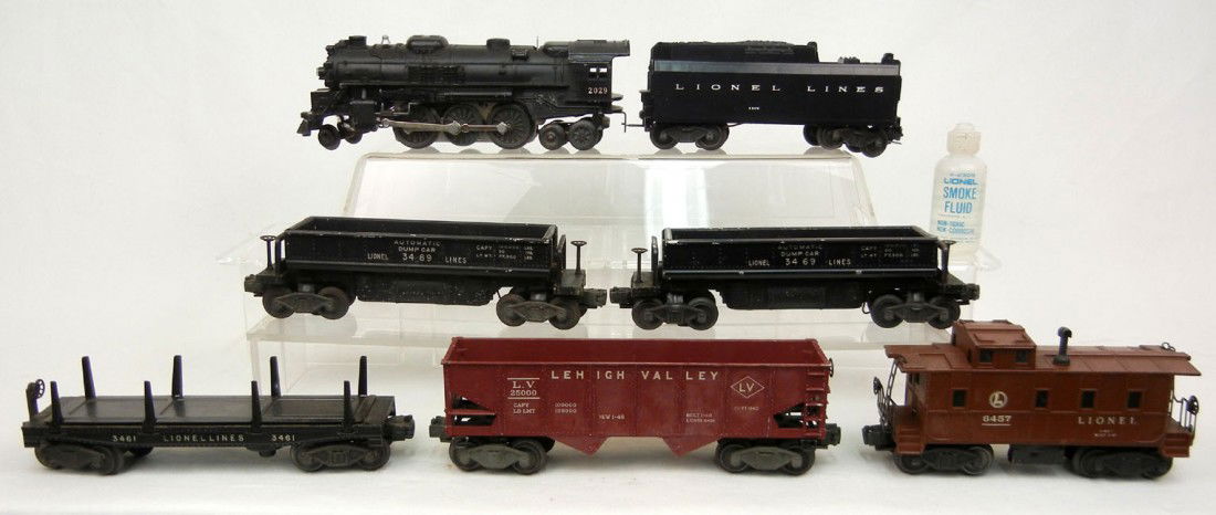 Lionel "O" gauge freight set including No. 2029 st: Lionel "O" gauge freight set including No. 2029 steam locomotive; No. 234W tender; two No. 3469 automatic dump cars; No. 3461 automatic lumber car; No. 6456 hopper; No. 6457 caboose; and additional Li