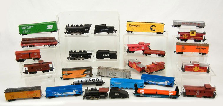 Grouping of twenty-eight HO scale engines, tenders: Grouping of twenty-eight HO scale engines, tenders, and freight cars, including Life-like, Mantua, Bachmann, Tyco, and AHM