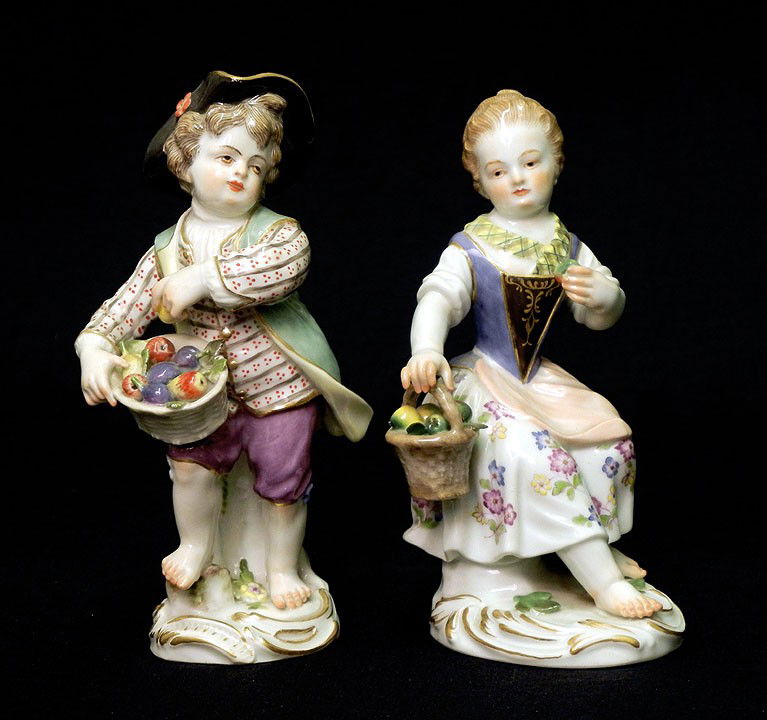 Pair of Meissen porcelain figurines, boy and girl w: Pair of Meissen porcelain figurines, boy and girl with fruit and flowers, both with blue underglaze crossed swords mark and impressed numbers on bottom, 5 1/2"